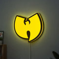 Wu Tang LED lightbox hanging on a wall with yellow glow