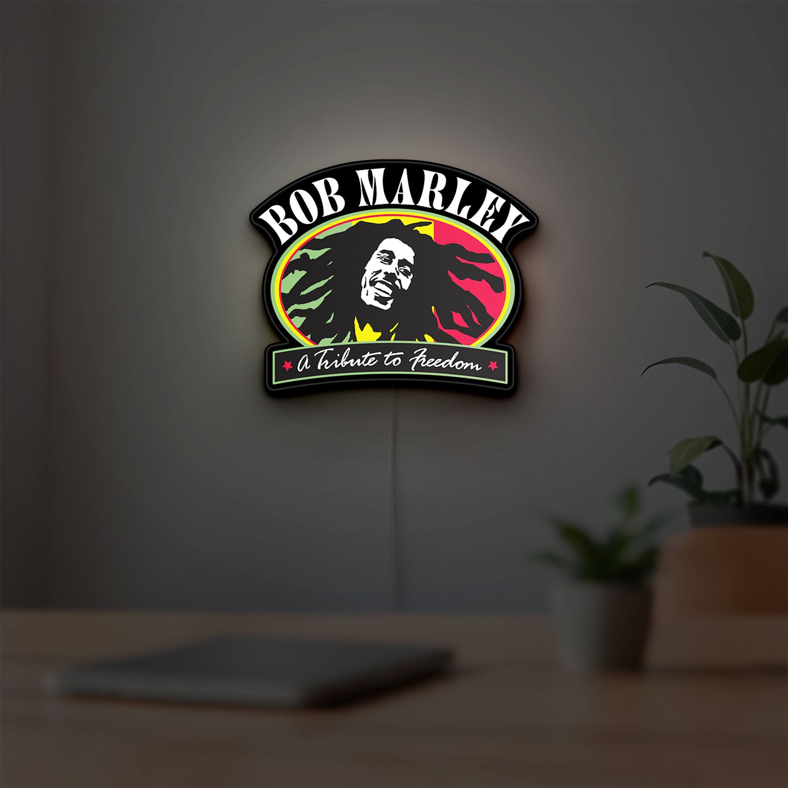 Bob Marley LED lightbox hanging on a room wall with soft white light