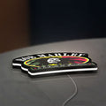 Bob Marley LED lightbox lying flat on a desk with white glow