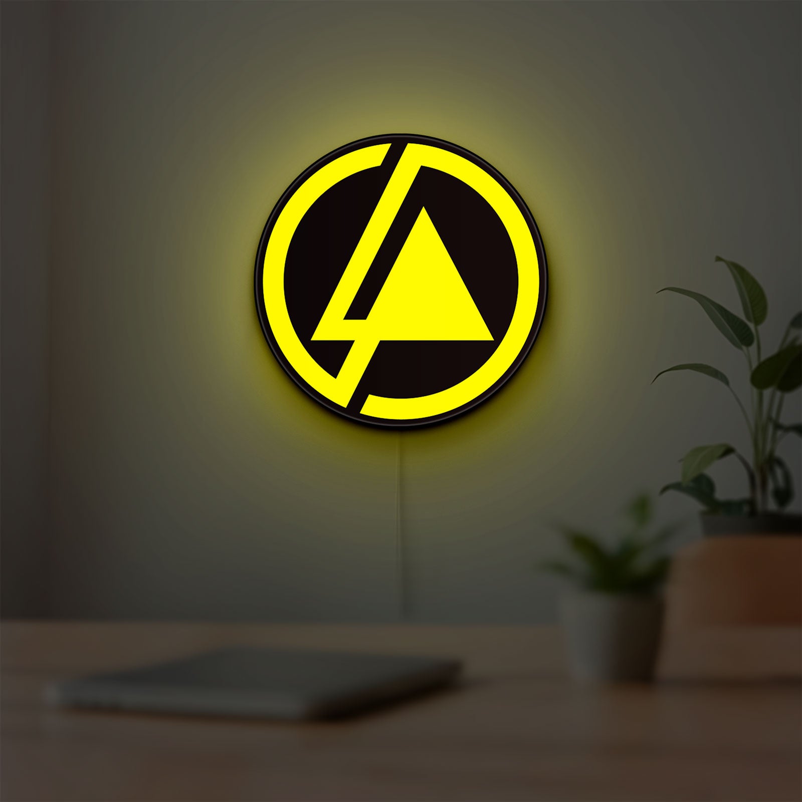 Linkin Park LED lightbox hanging on a room wall with soft yellow light