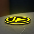 Linkin Park LED lightbox lying flat on a desk with yellow glow
