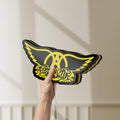Unlit Aerosmith LED lightbox held by hand to show size and details