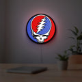 Grateful Dead LED lightbox hanging on a room wall with soft white light