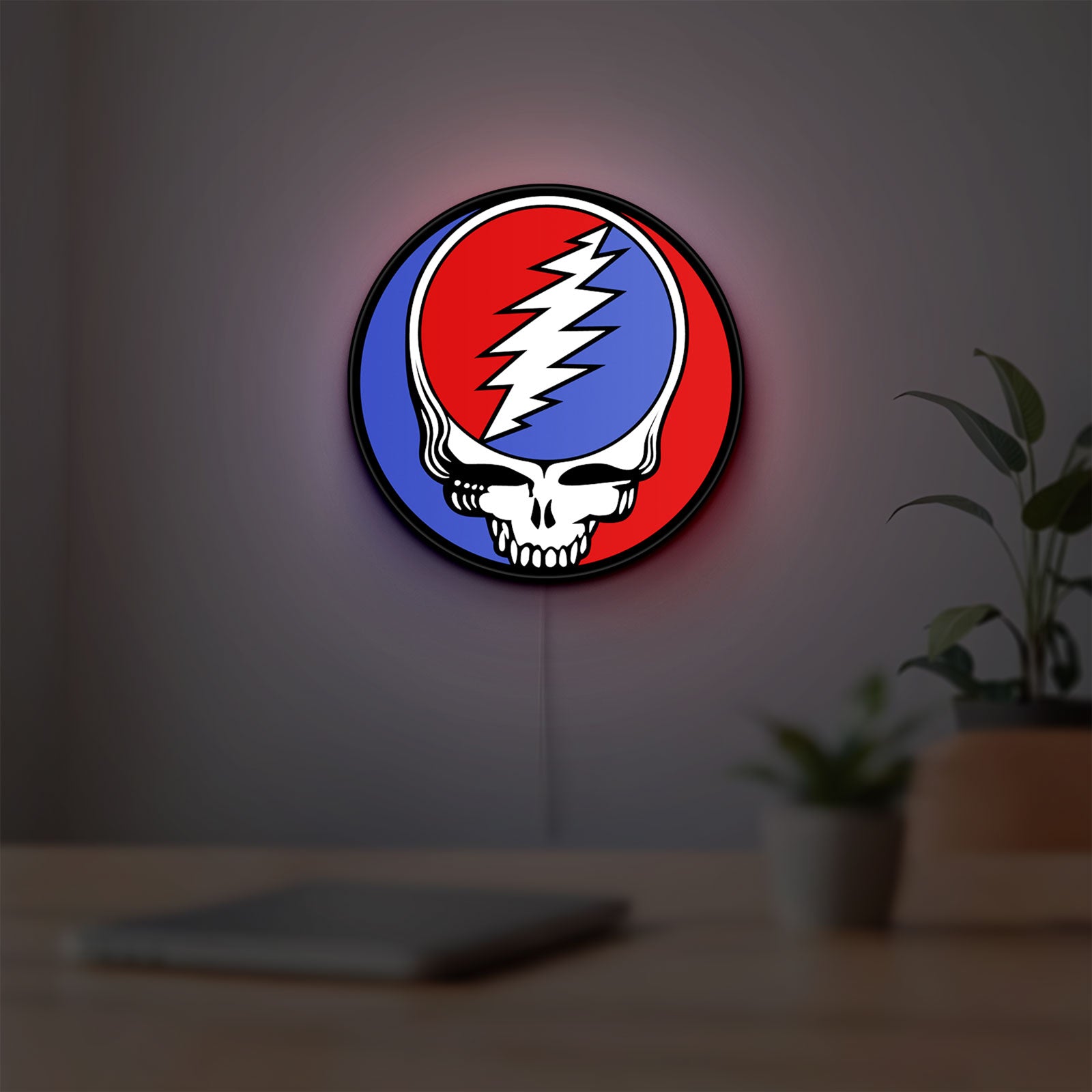 Grateful Dead LED lightbox hanging on a room wall with soft white light