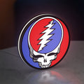 Grateful Dead LED lightbox standing on a desk from an angled side view with white glow