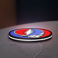 Grateful Dead LED lightbox lying flat on a desk with white glow