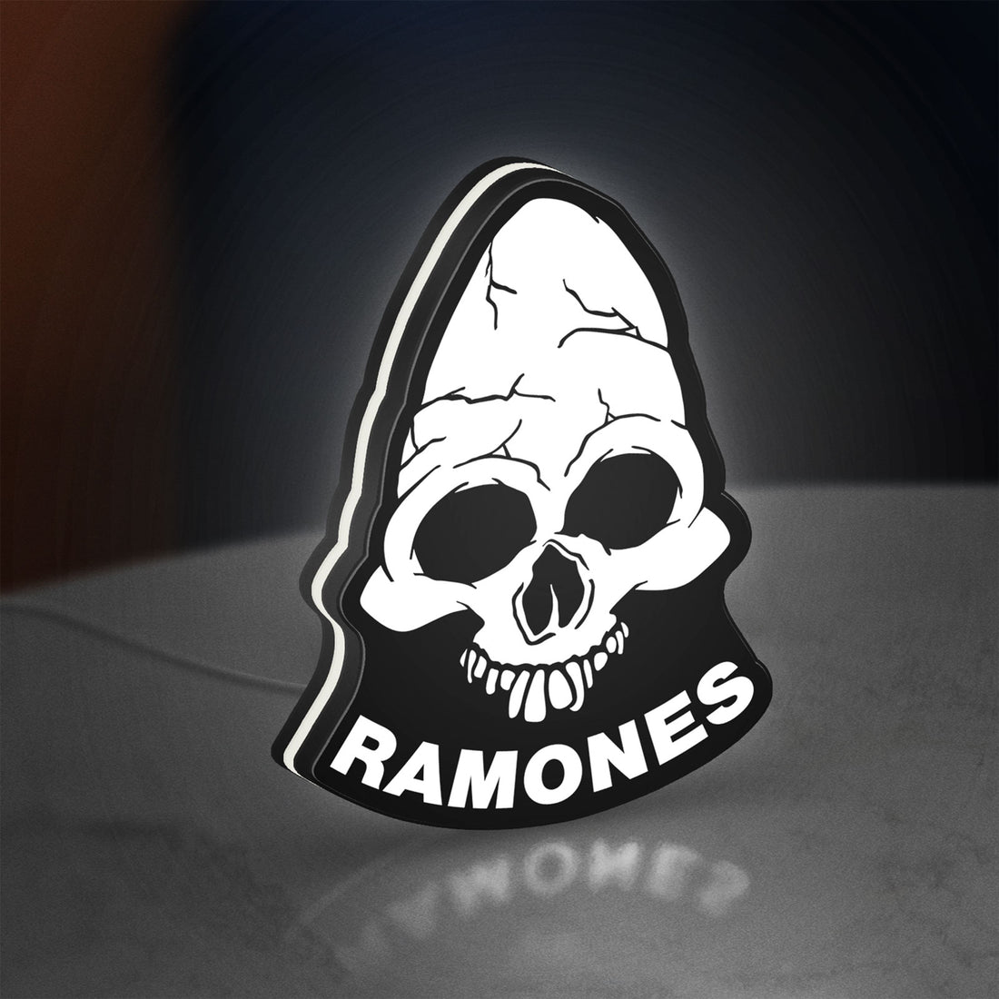 Ramones LED lightbox hanging on a wall with white glow