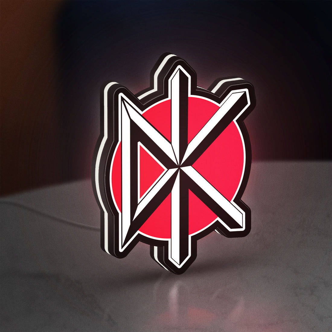 Dead Kennedys LED lightbox hanging on a wall with white glow