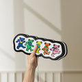Unlit Grateful Dead Dancing Bears LED lightbox held by hand to show size and details