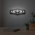 Masters Of Hardcore LED lightbox hanging on a room wall with soft white light