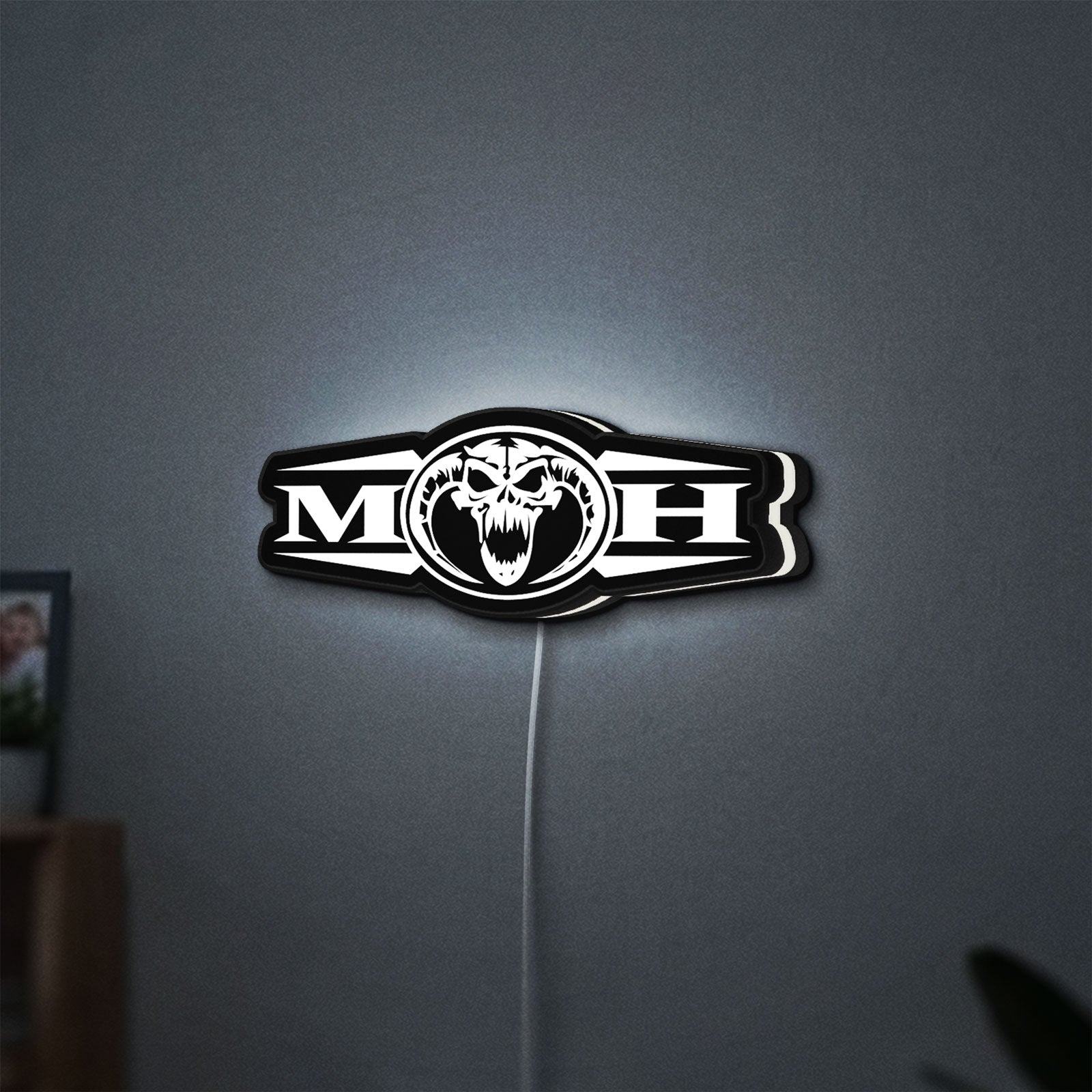 Masters Of Hardcore LED lightbox hanging on a wall with white glow