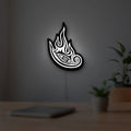 Tool Lateralus Eye LED lightbox hanging on a room wall with soft white light
