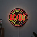 AC DC Rock N Roll LED lightbox hanging on a wall with red glow