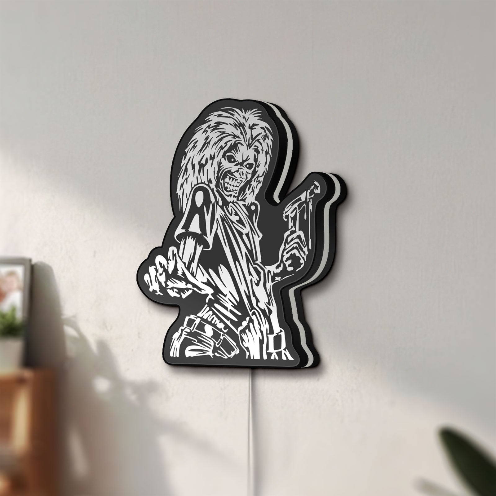 Unlit Iron Maiden Killers LED lightbox mounted on a wall in daylight