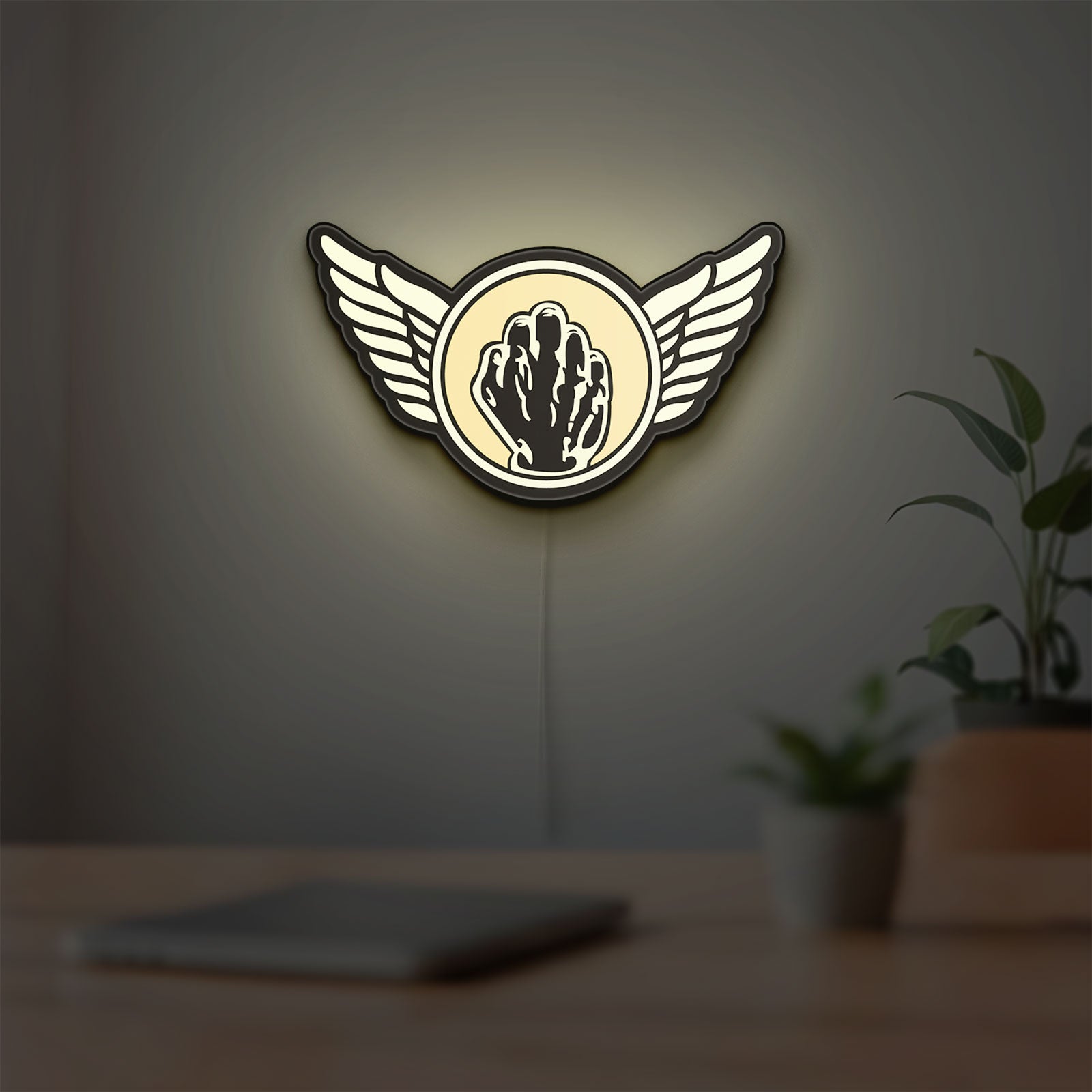 Kiss Army Fist LED lightbox hanging on a room wall with soft white light