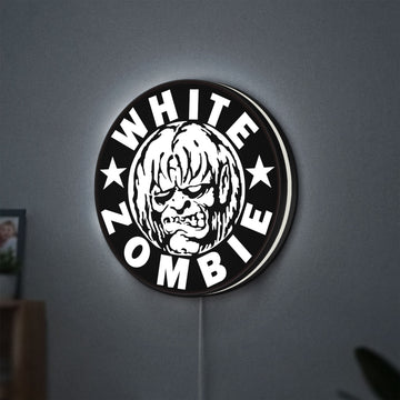 White Zombie Band LED lightbox hanging on a wall with white glow