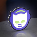 Napster LED lightbox standing on a desk from an angled side view with white glow