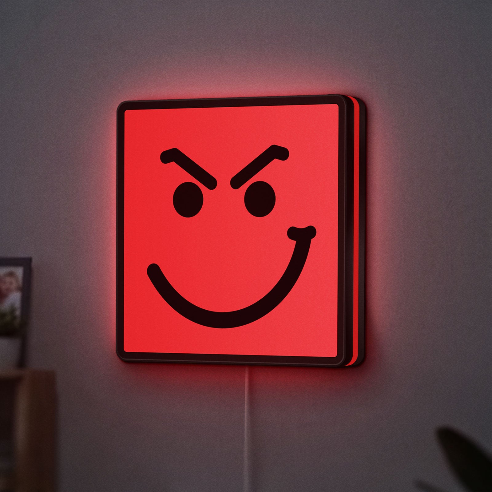 Have A Nice Day LED lightbox hanging on a wall with red glow