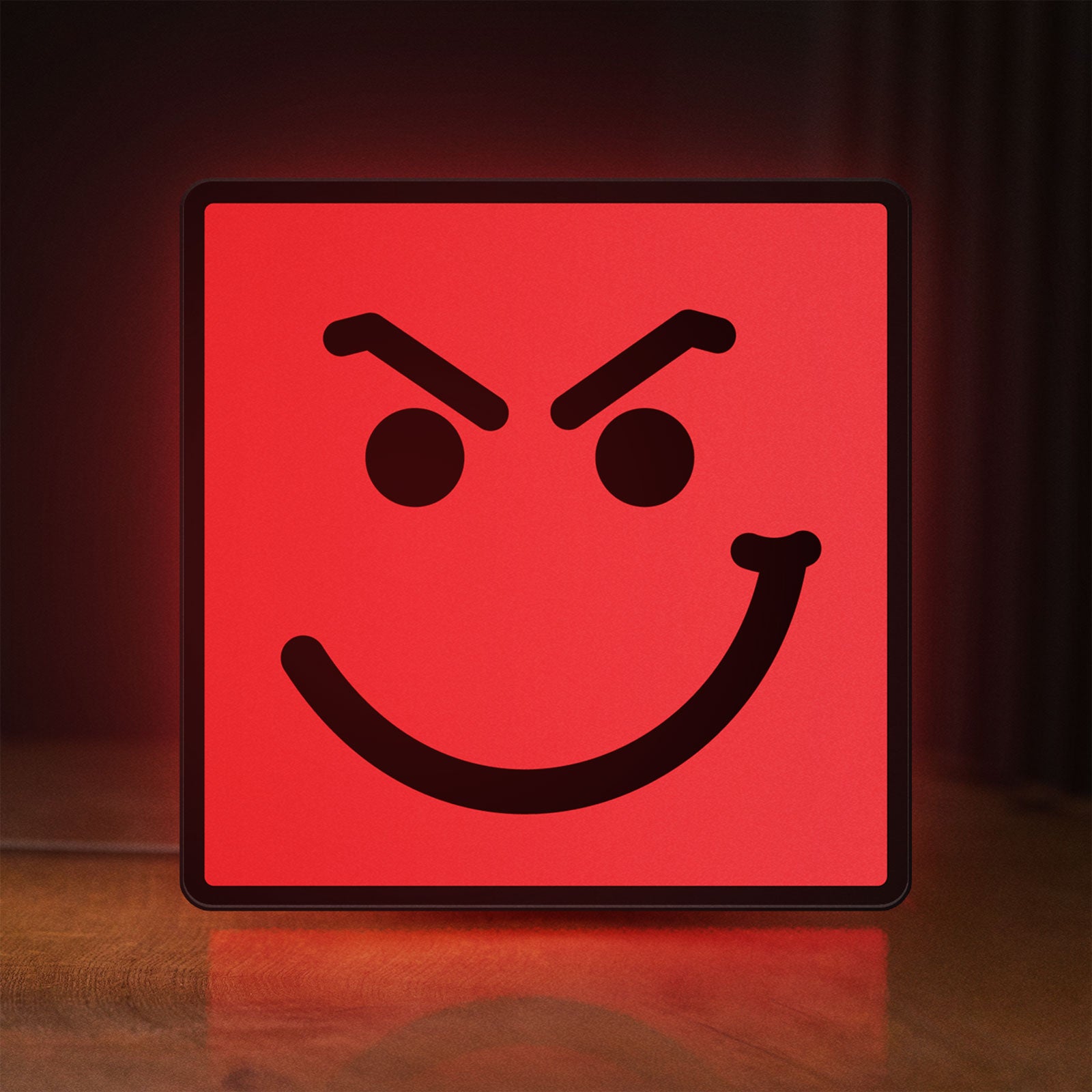 Front view of Have A Nice Day LED lightbox sign glowing on a wooden desk