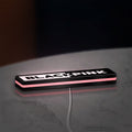 Blackpink LED lightbox lying flat on a desk with pink glow