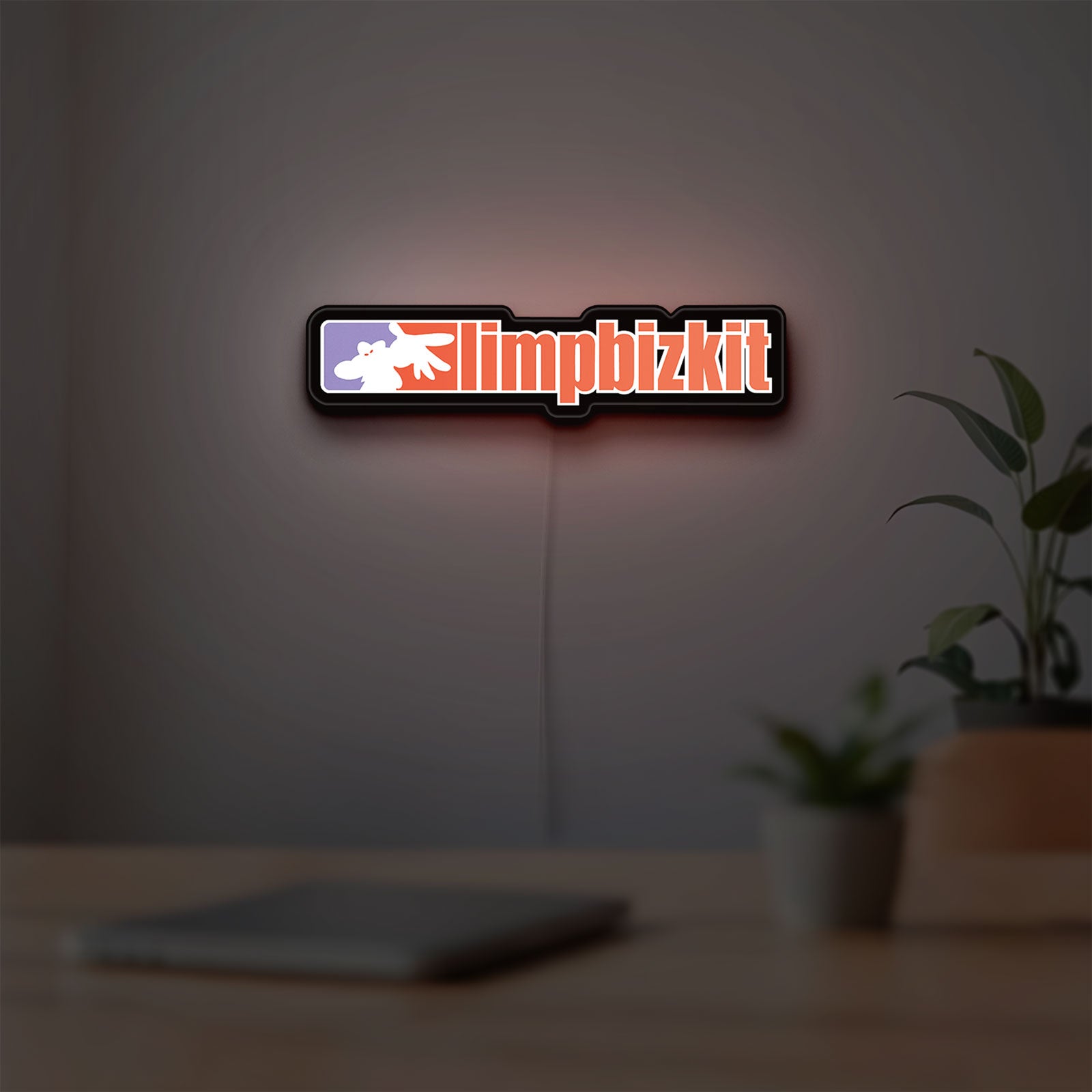 Limp Bizkit LED lightbox hanging on a room wall with soft white light