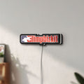 Unlit Limp Bizkit LED lightbox mounted on a wall in daylight