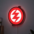 Zoe LED lightbox hanging on a wall with red glow