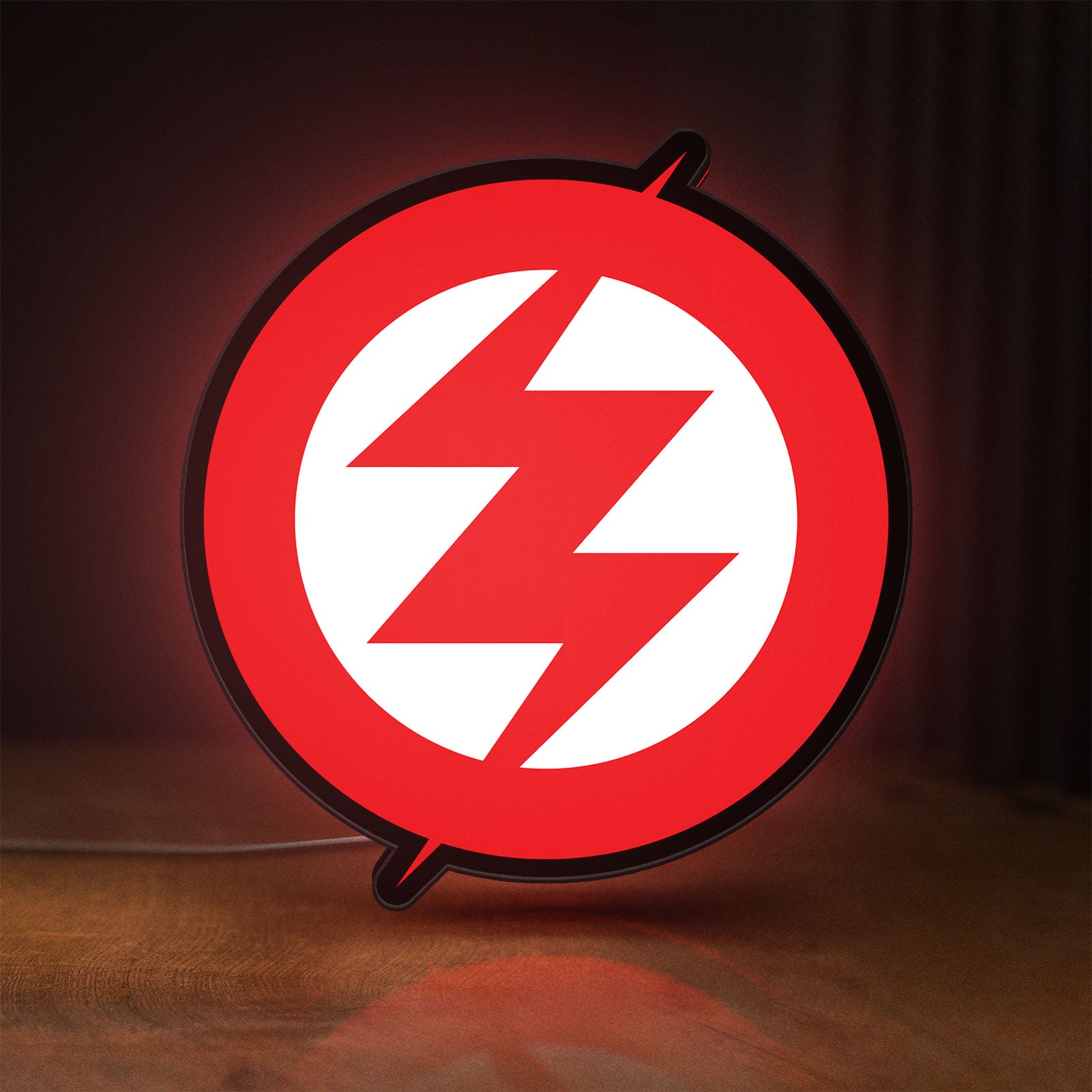 Front view of Zoe LED lightbox sign glowing on a wooden desk