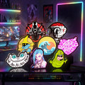 Various personalized 3D LED glowing signs with pop culture, gaming, and anime characters for cool desk decor.