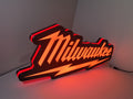 Milwaukee Play Button LED Light Box (50cm) - Illuminated angled view standing, perfect for garage and man cave decor