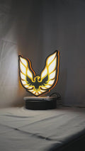 Product video showcase of Pontiac Firebird 1977 3D LED Sign, demonstrating unlit and illuminated lighting effects with a 360-degree rotating view, perfect for garage and man cave decor.