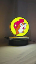 Product video showcase of Buc Ee S Beaver Mascot 3D LED Sign, demonstrating unlit and illuminated lighting effects with a 360-degree rotating view, unique wall art for desk and room decor.
