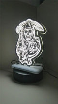 Product video showcase of Sons Of Anarchy 3D LED Sign, demonstrating unlit and illuminated lighting effects with a 360-degree rotating view, unique wall art for desk and room decor.