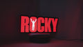 Product video showcase of Rocky Balboa 3D LED Sign, demonstrating unlit and illuminated lighting effects with a 360-degree rotating view, perfect for music studio and bedroom decor.