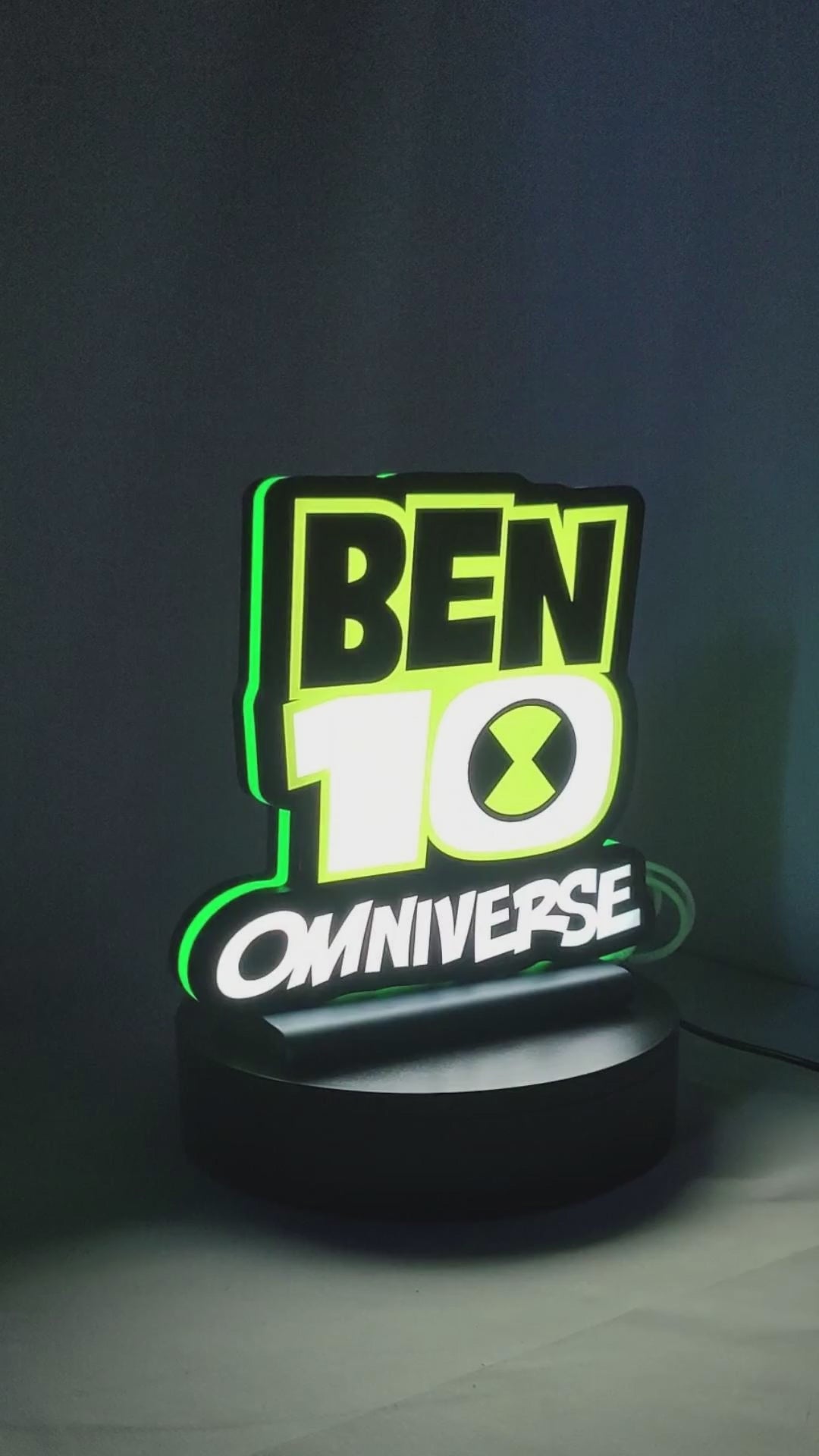 Product video showcase of Ben 10 Omniverse 3D LED Sign, demonstrating unlit and illuminated lighting effects with a 360-degree rotating view, unique wall art for desk and room decor.